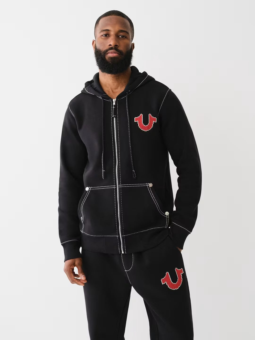 BIG T CROSS STITCH ZIP UP