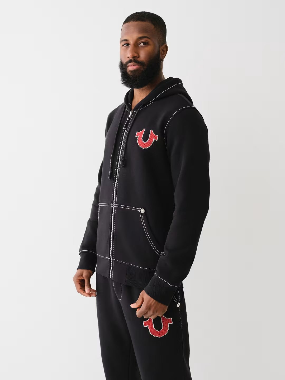 BIG T CROSS STITCH ZIP UP