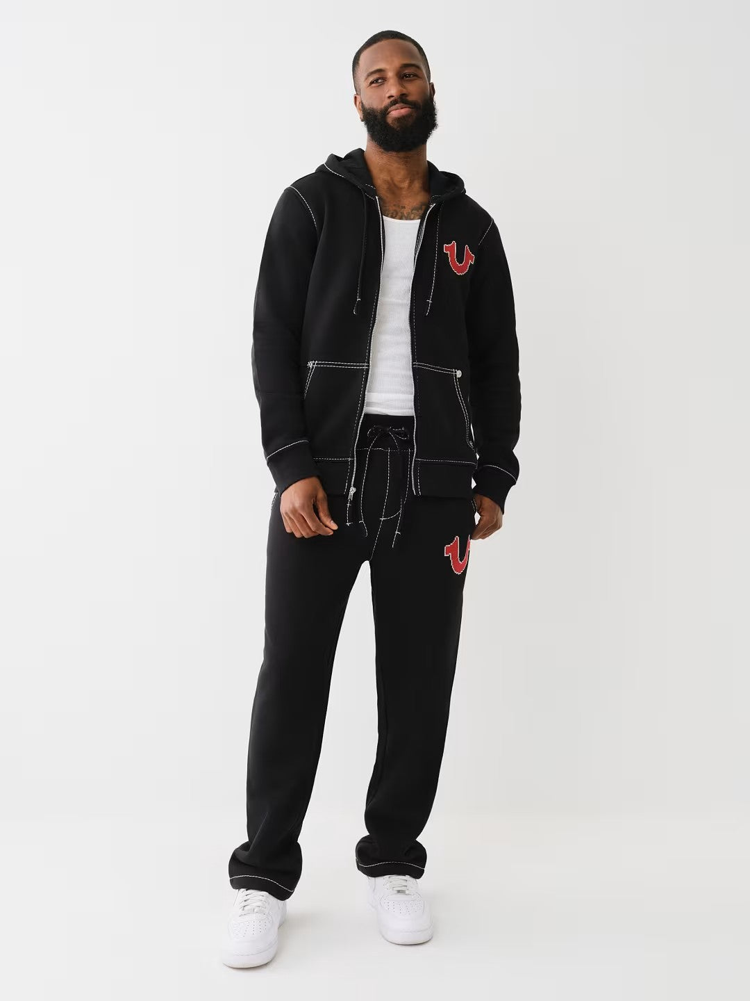 BIG T CROSS STITCH ZIP UP