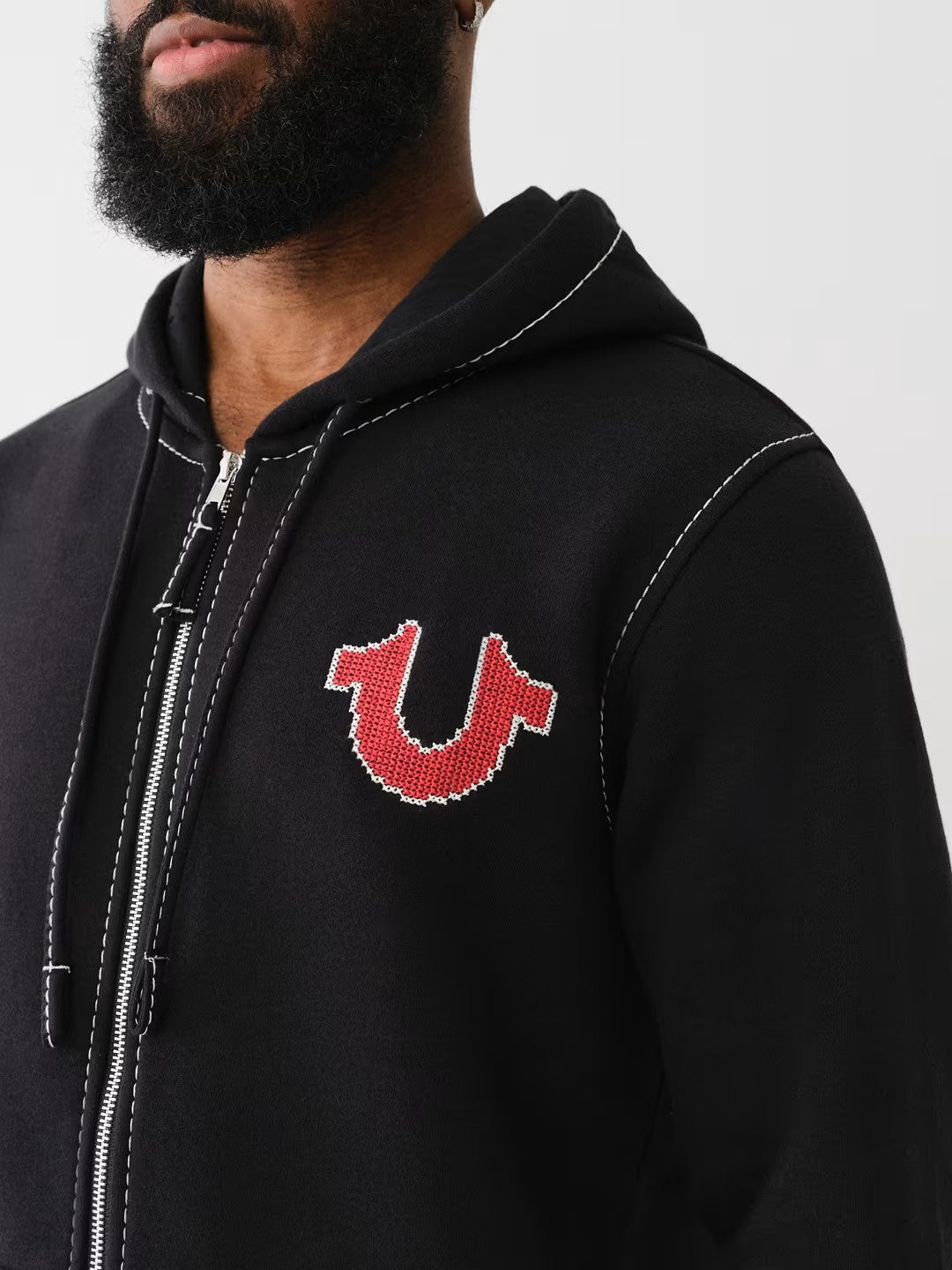 BIG T CROSS STITCH ZIP UP