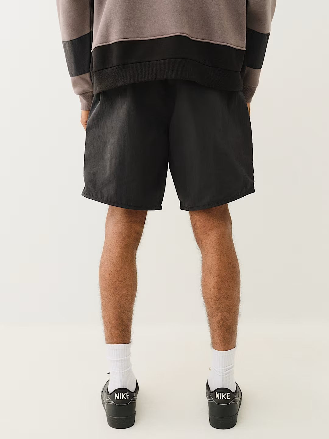 CURVED NYLON SHORT