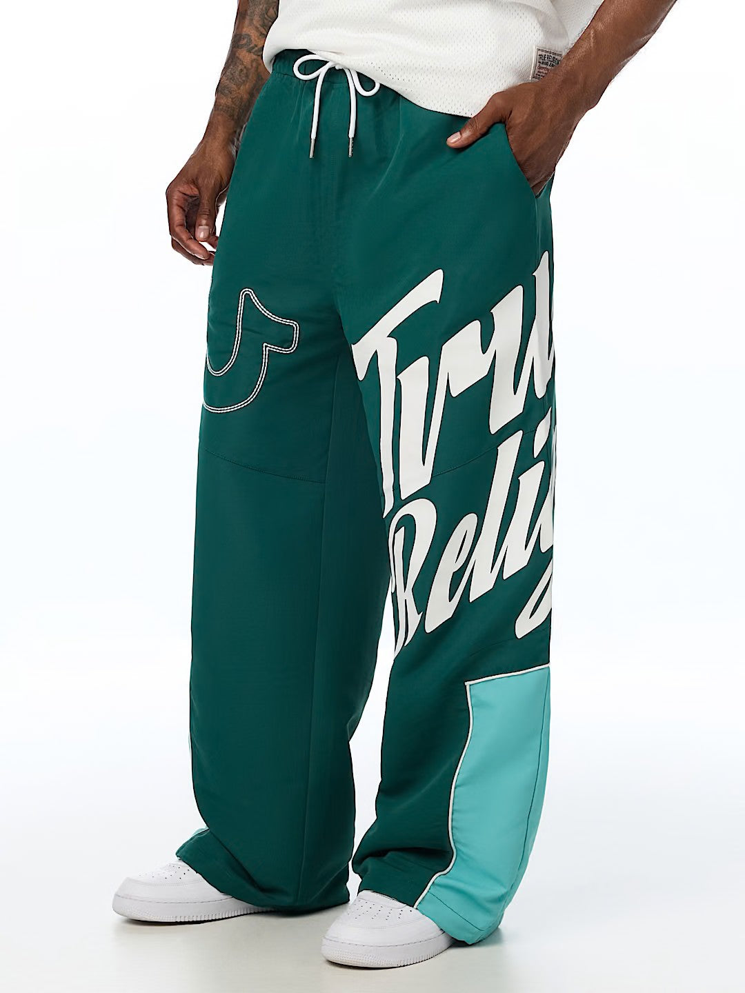 HS LOGO BAGGY NYLON PANTS