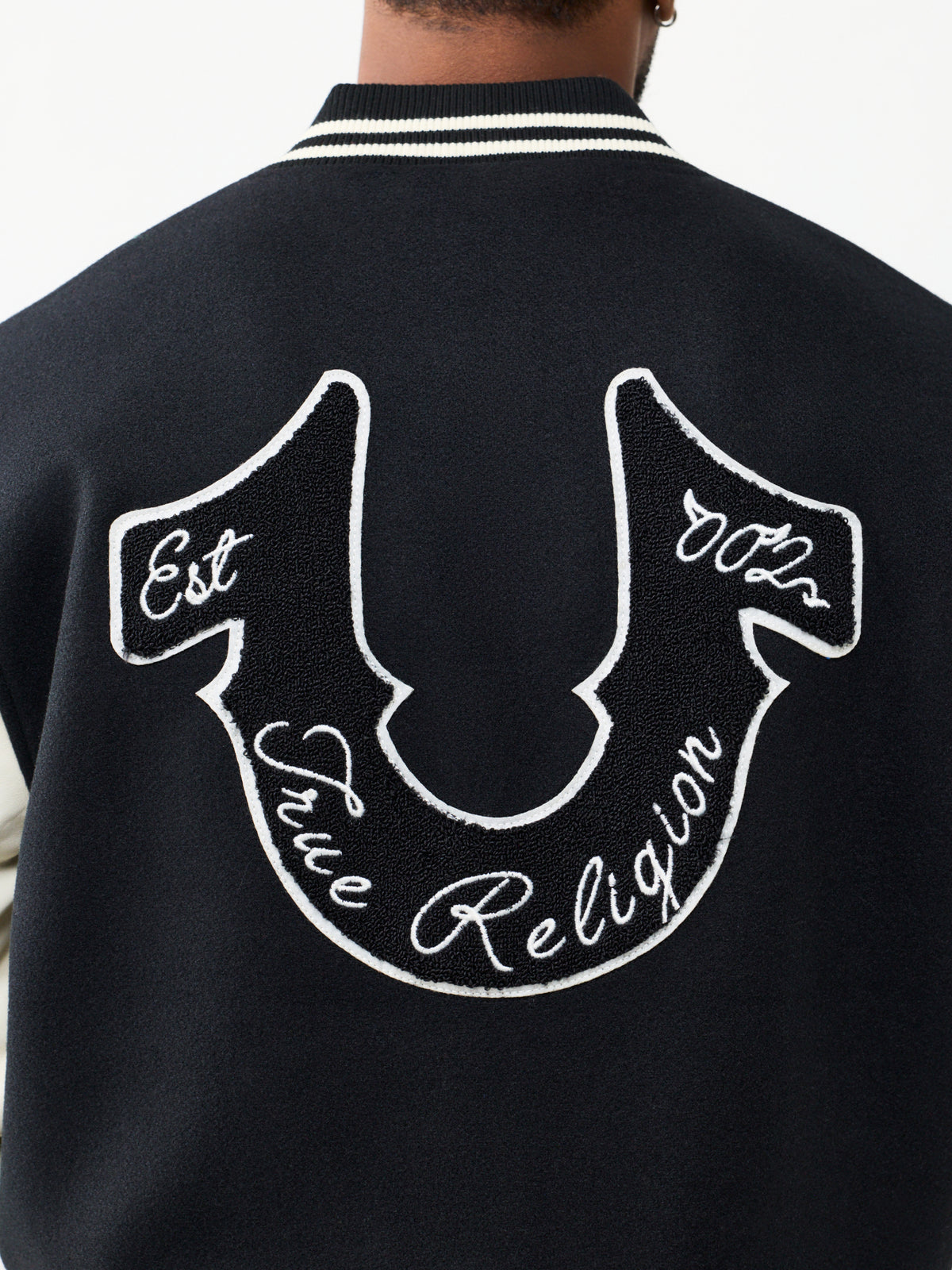 PROPERTY OF NONE WOOL VARSITY
