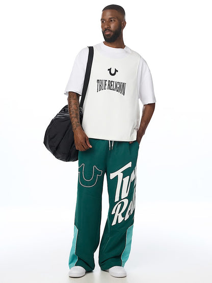 HS LOGO BAGGY NYLON PANTS