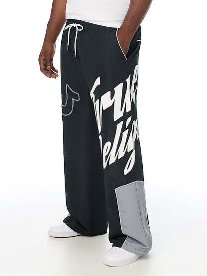 HS LOGO BAGGY NYLON PANTS