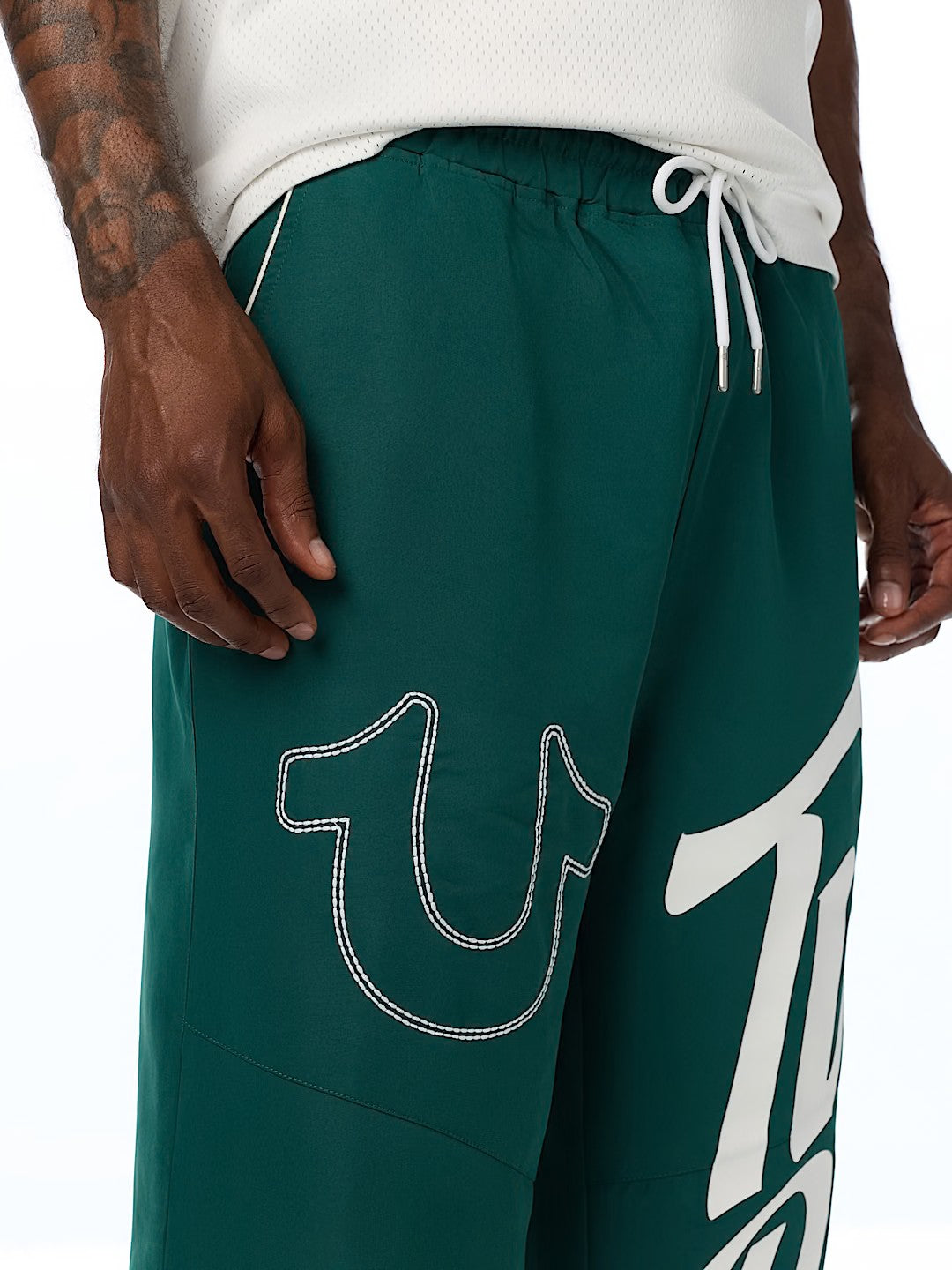 HS LOGO BAGGY NYLON PANTS