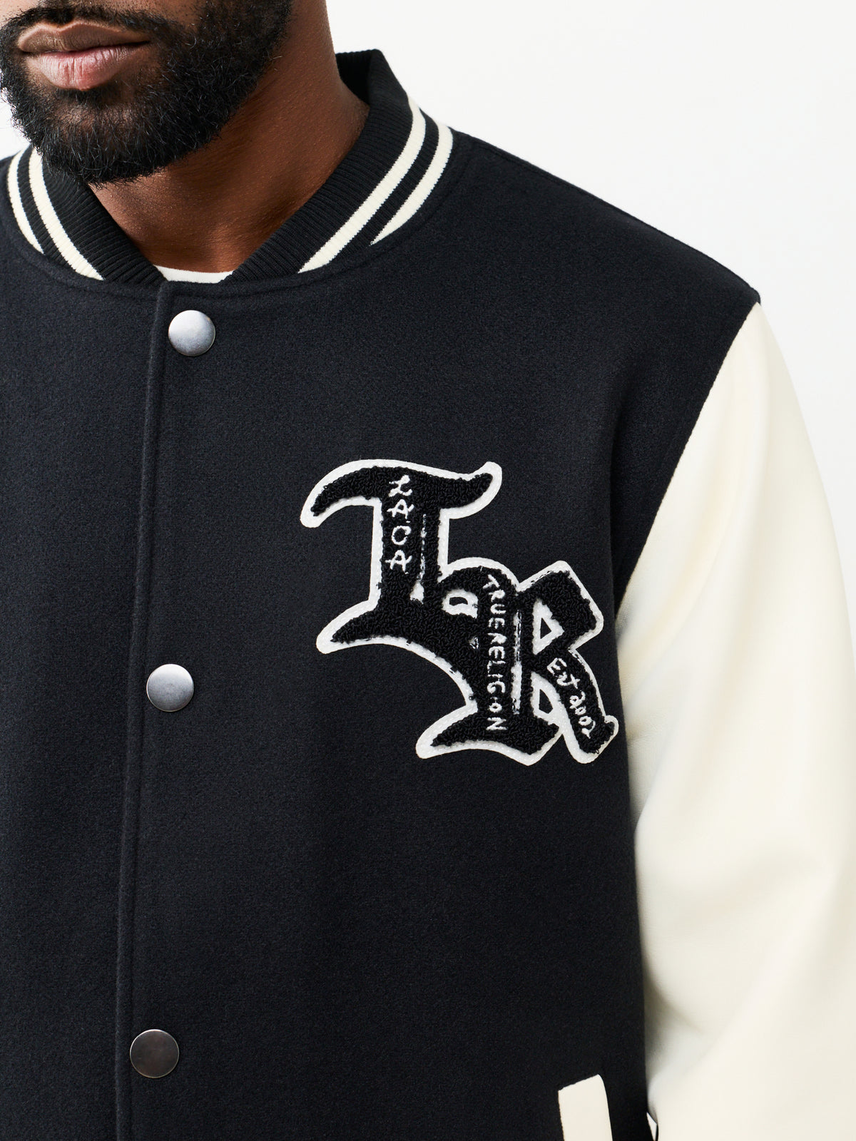 PROPERTY OF NONE WOOL VARSITY