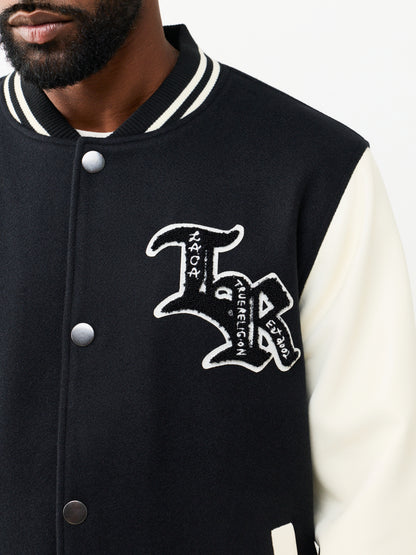 PROPERTY OF NONE WOOL VARSITY