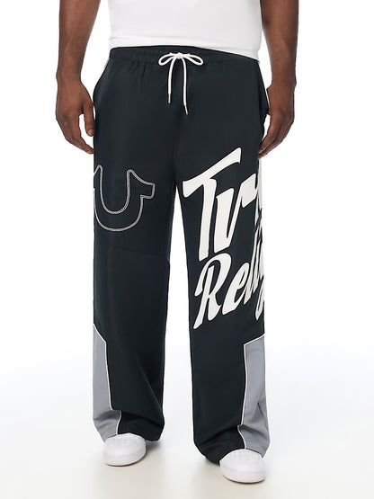 HS LOGO BAGGY NYLON PANTS